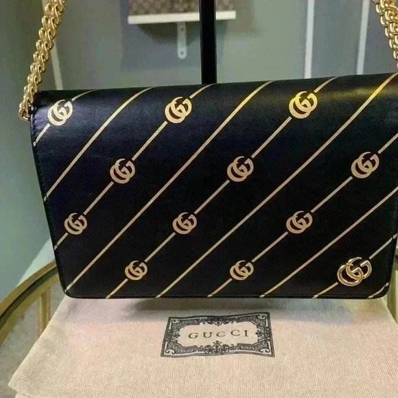 Gucci mini leather chain bag with double G stripe in black and gold. - Picture 2 of 14